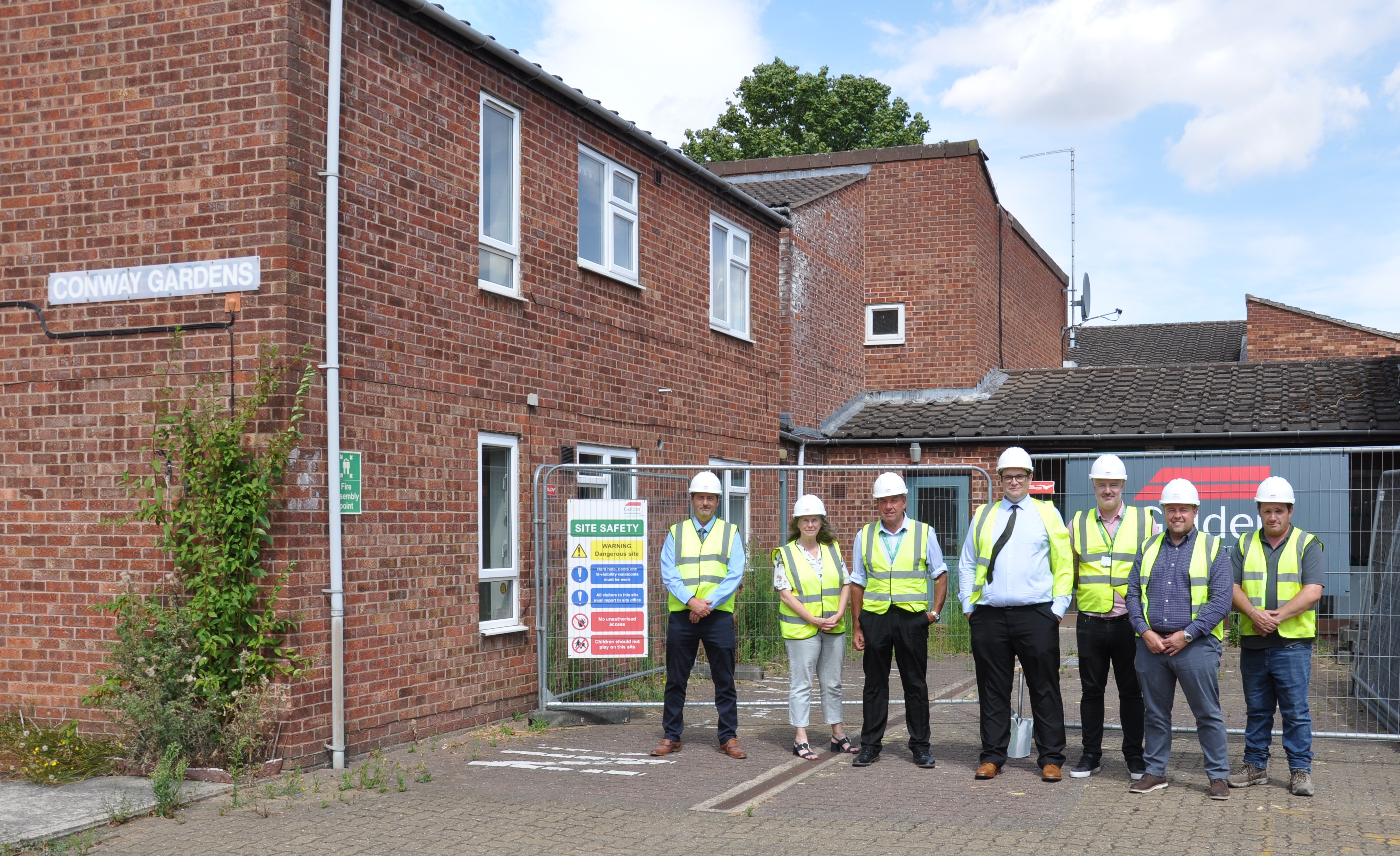 Councillor Schuller with Gary Smith, Chris Redfearn and Contractors, Gelder Group, stood outside of Conway Gardens