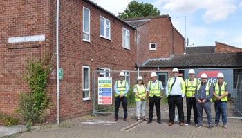 Councillor Schuller with Gary Smith, Chris Redfearn and Contractors, Gelder Group, stood outside of Conway Gardens